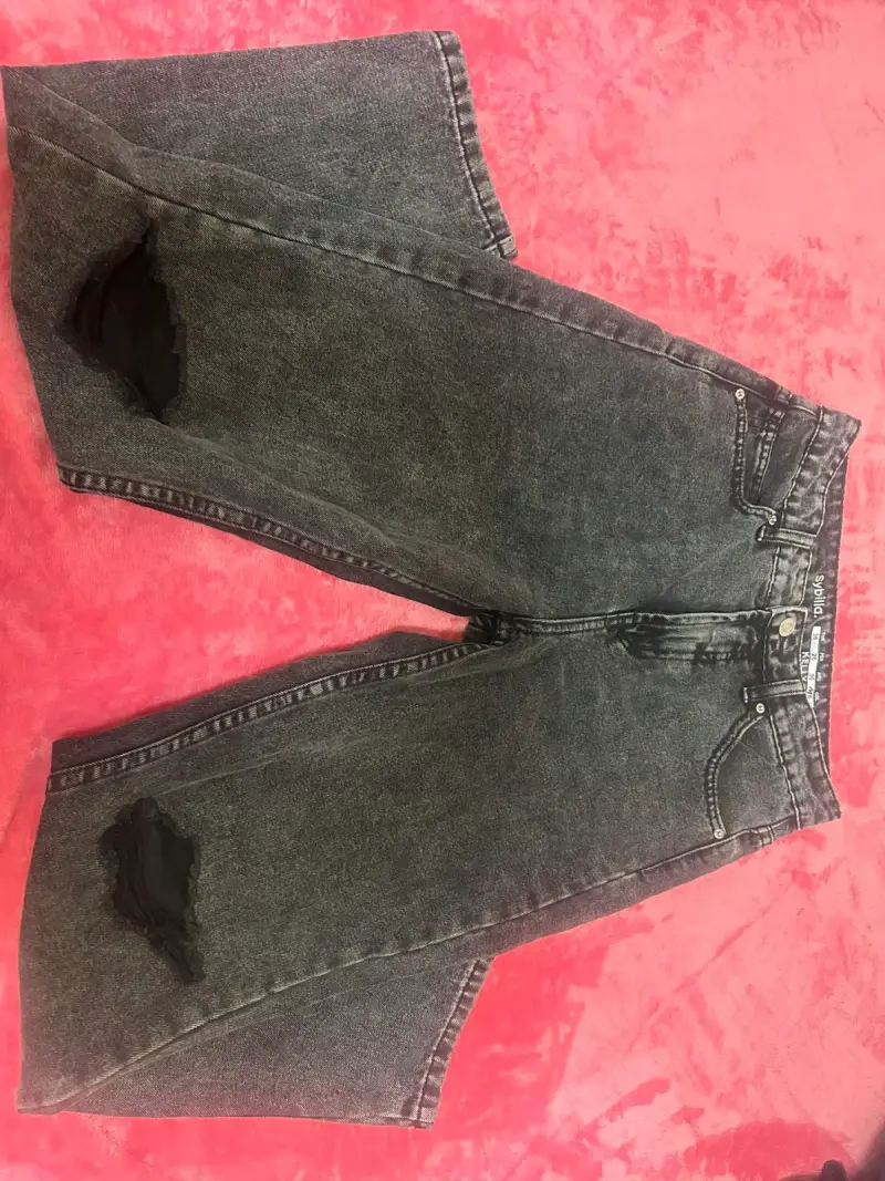 Jeans negros desgastados para hombre