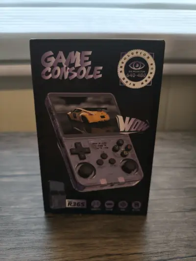 Consola Retro R36S Morada + Caja y Accesorios - miniatura 1