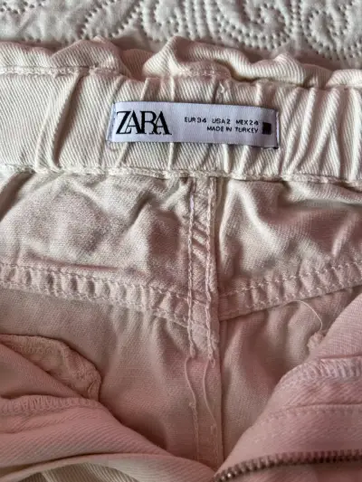 Pantalones beige de tiro alto Zara para mujer - miniatura 2