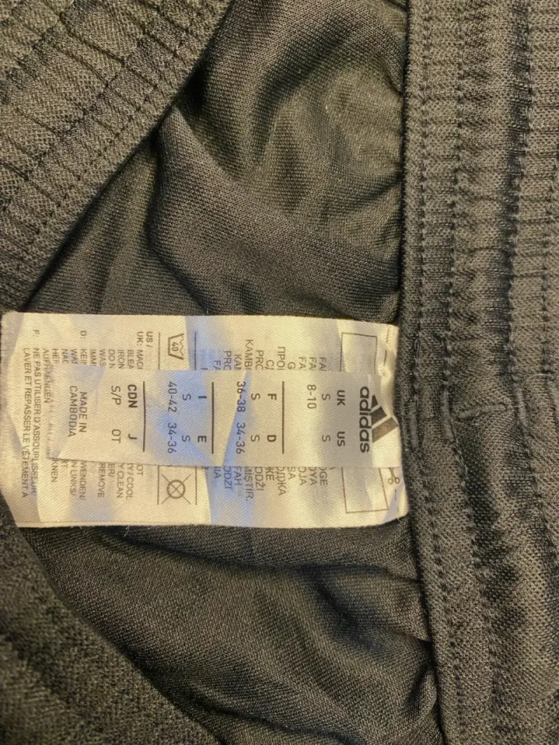 Shorts deportivos negros Adidas con franjas blancas - 3