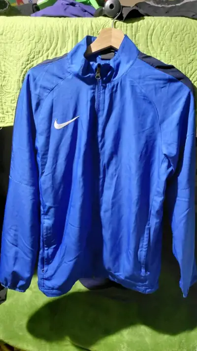 Chaqueta deportiva azul Nike Dri-Fit - miniatura 1