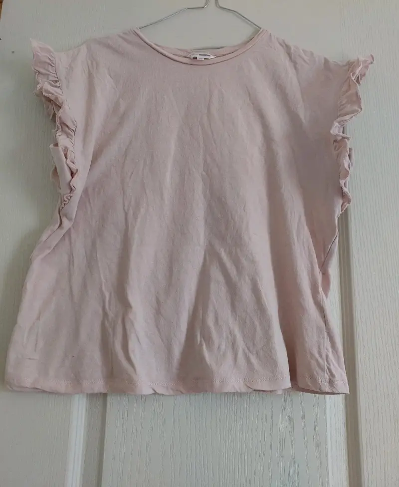 Polera rosa con volantes talla s