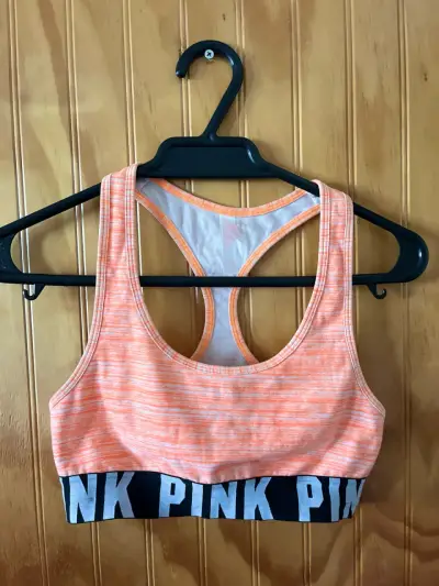 Top deportivo naranja con logo Pink - miniatura 1