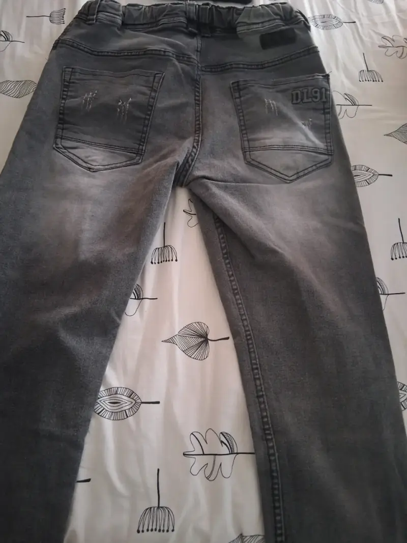 Jeans grises desgastados talla 28 - 2