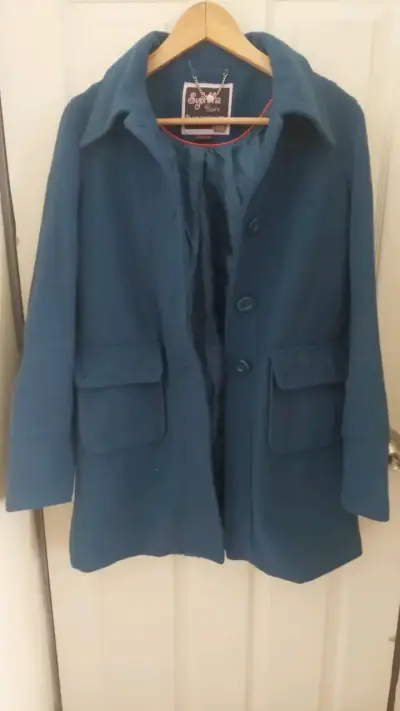 Abrigo azul con capucha para mujer - miniatura 1