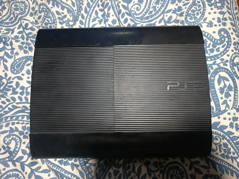 Consola PS3 Super Slim en buen estado - 1