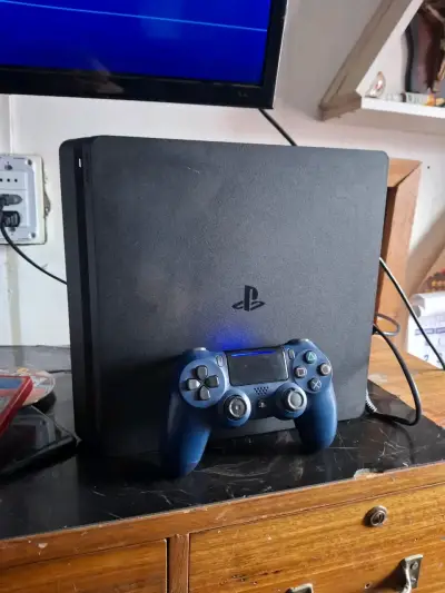 PS4 Slim 1tb + Mando Original + GTA V y NFS - miniatura 1