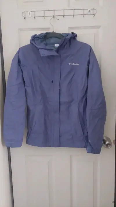 Chaqueta impermeable Columbia azul con capucha - miniatura 1