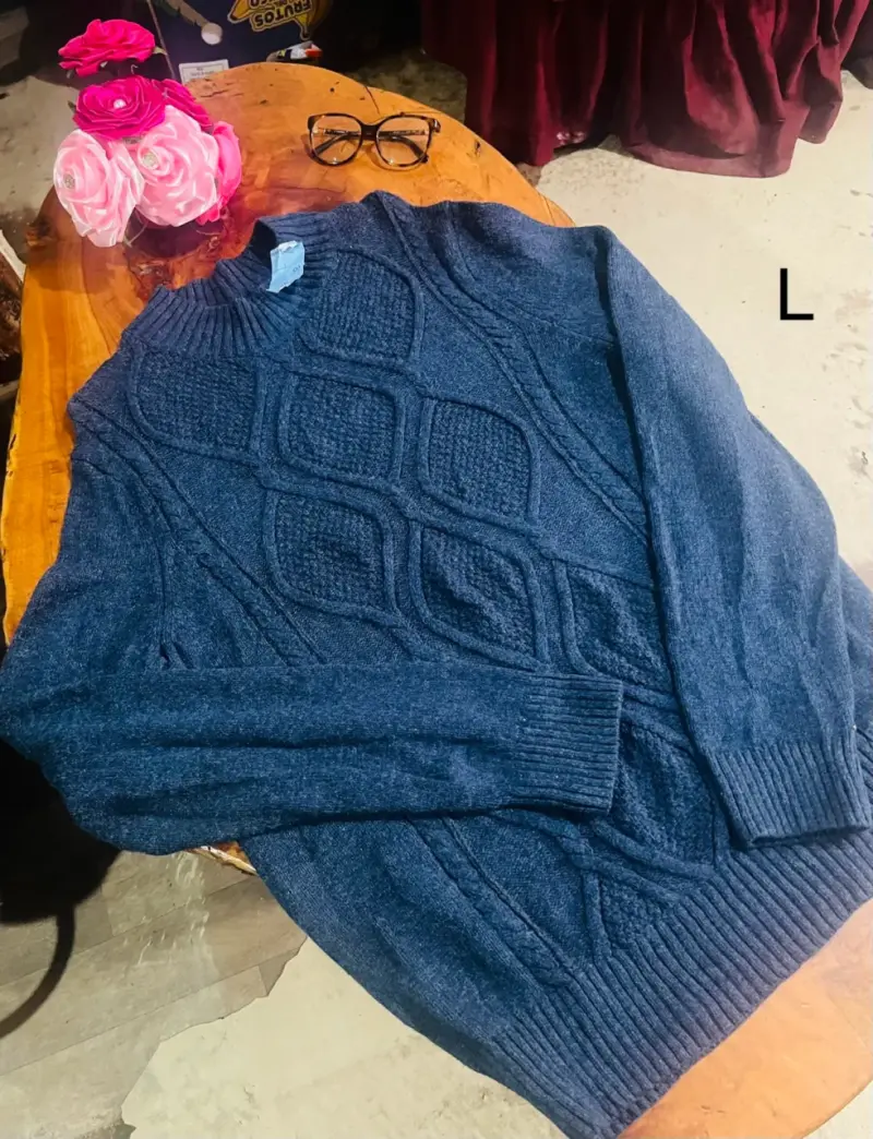Suéter azul de lana para hombre