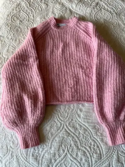 Suéter rosa de lana con mangas abullonadas - miniatura 1