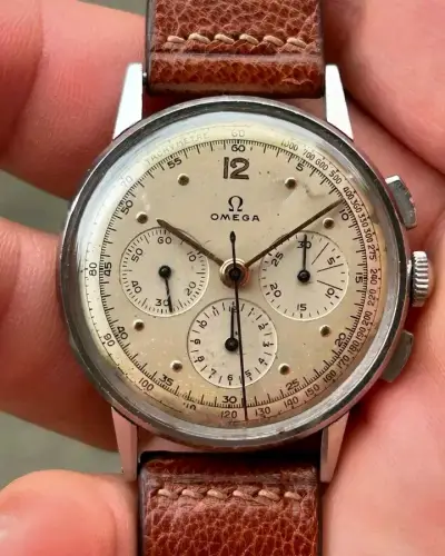 Reloj Omega vintage cronógrafo de cuero - miniatura 1