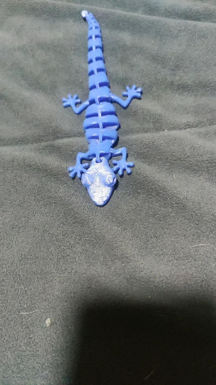 Figura decorativa de lagarto azul