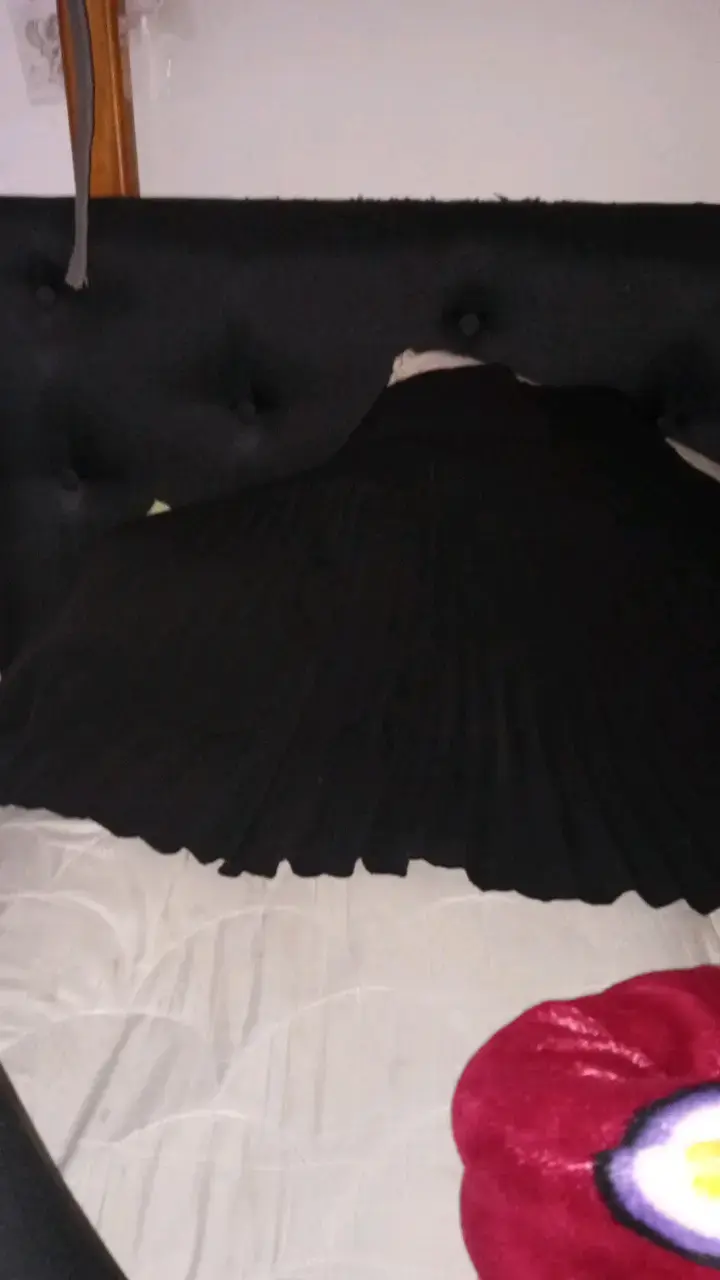 Falda plisada negra elegante