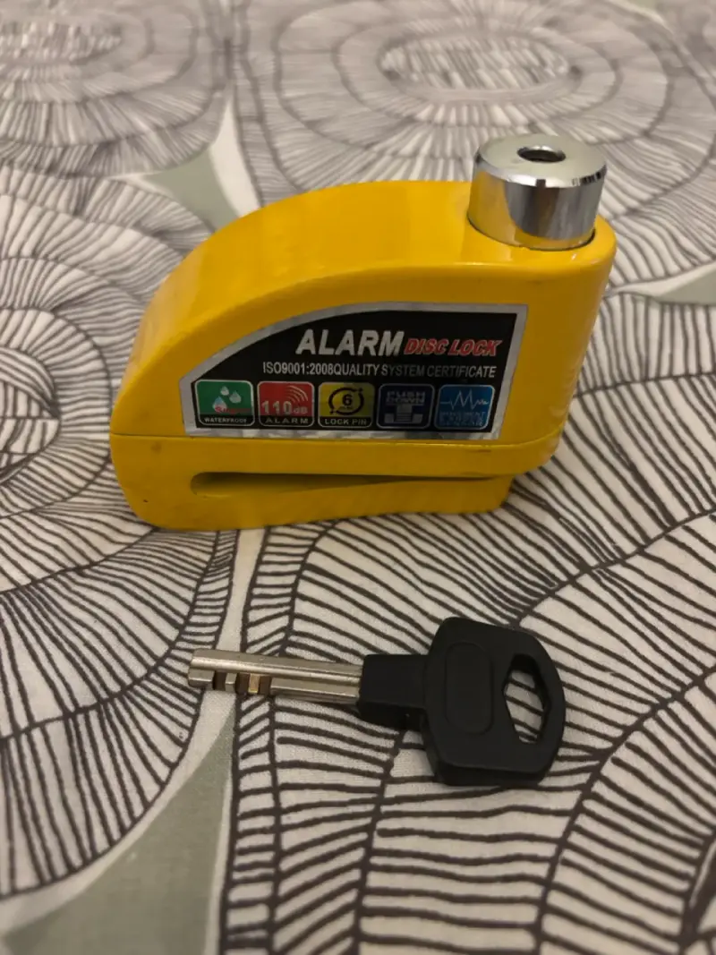 Candado de Disco con Alarma 110dB Amarillo - 1