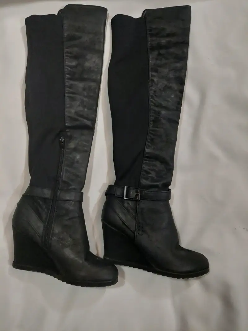 Botas negras de cuero con plataforma alta - 1