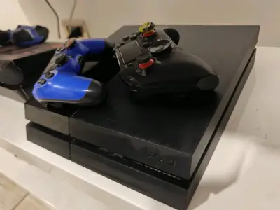Consola PS4 con dos controles y 1 juegos incluido - miniatura 2