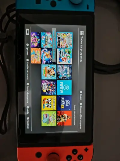 Nintendo Switch con accesorios y juegos - miniatura 1