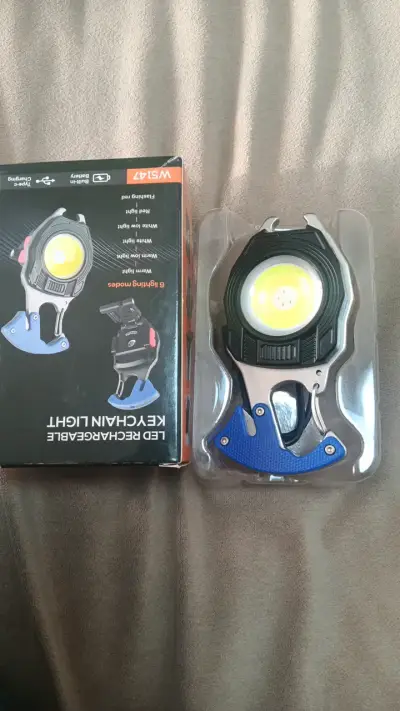 Linterna LED Recargable con Cortador de Cinturón - miniatura 1