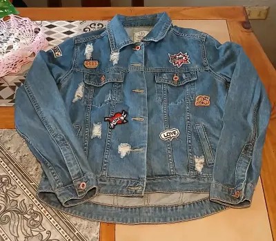 Chaqueta de mezclilla con parches estilo casual - miniatura 1