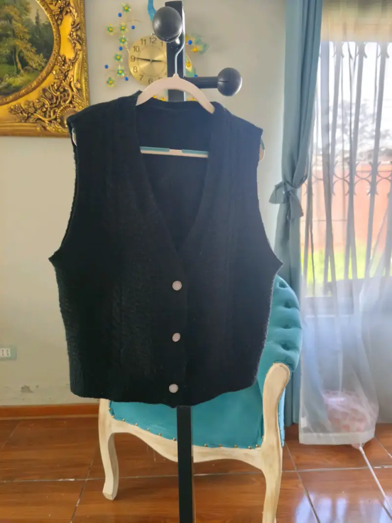 Chaleco de punto negro sin mangas