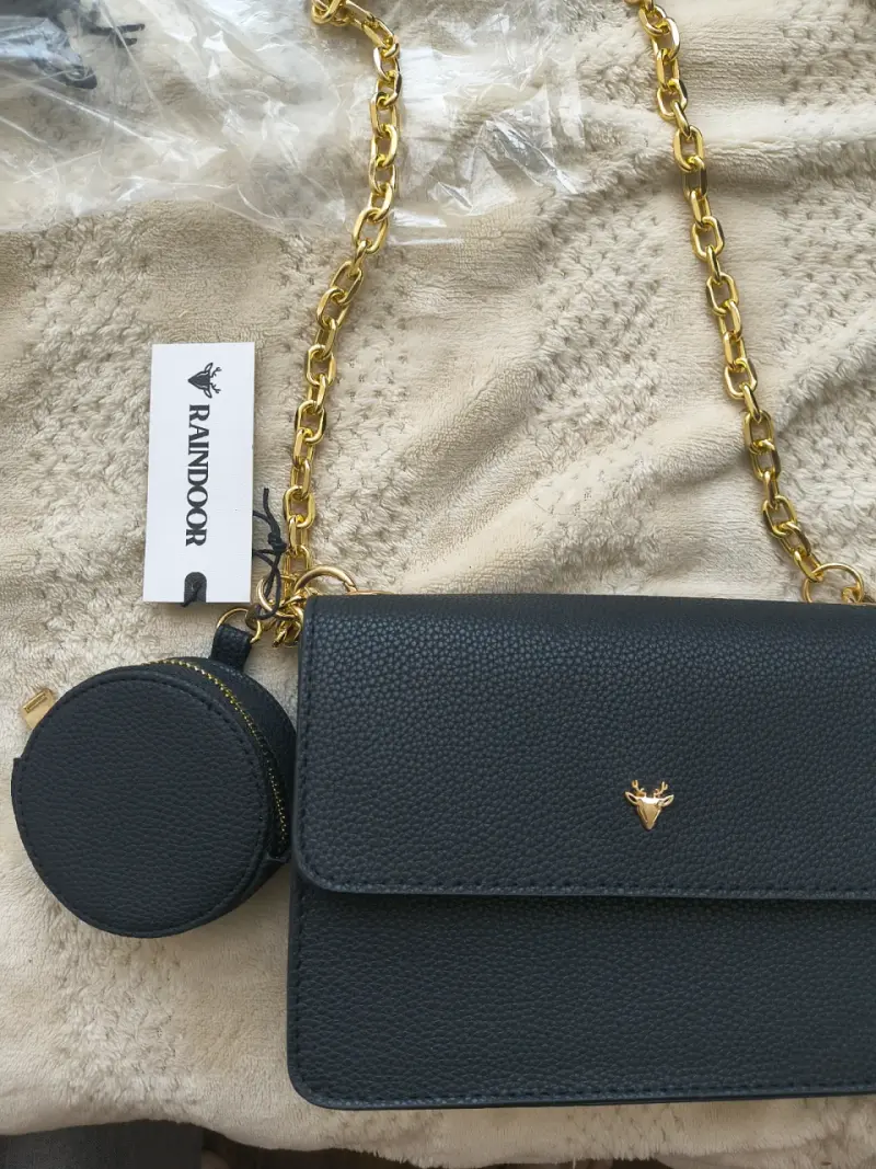 Cartera Raindoor - 1