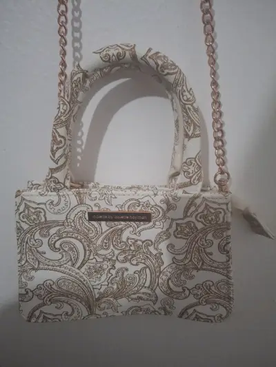 Bolso de mano estampado con cadena dorada - miniatura 1