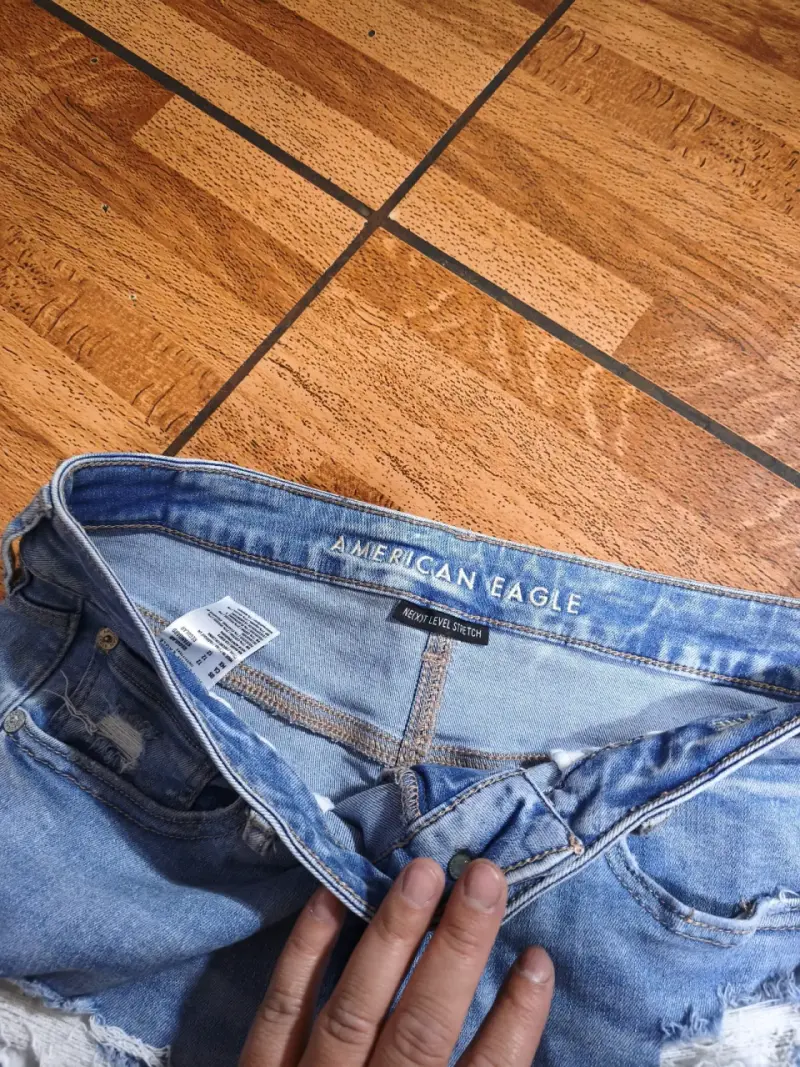 Jeans acampanados desgastados American Eagle - 3