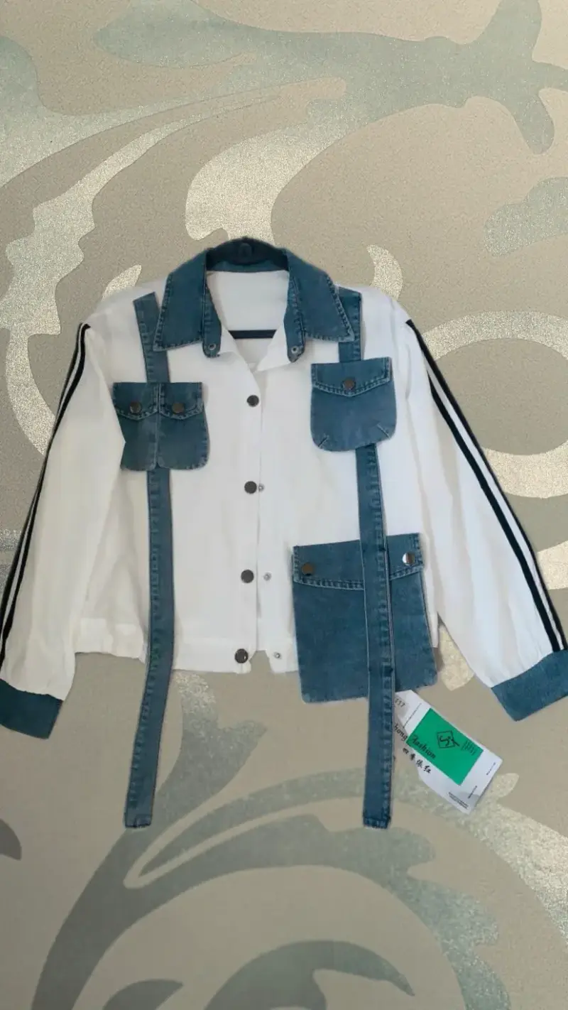 Blusa blanca con flecos y detalles bordados - 2