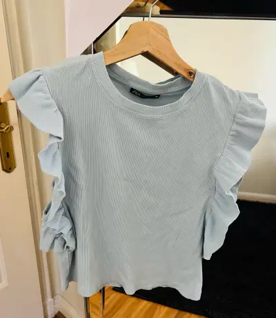 Polera Zara azul con volantes - miniatura 1