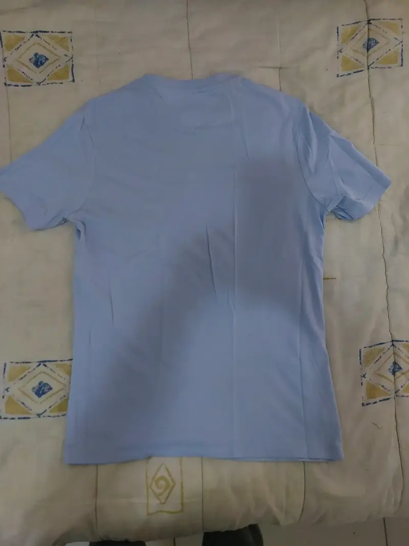 Polera Tommy Hilfiger azul claro para hombre - 2