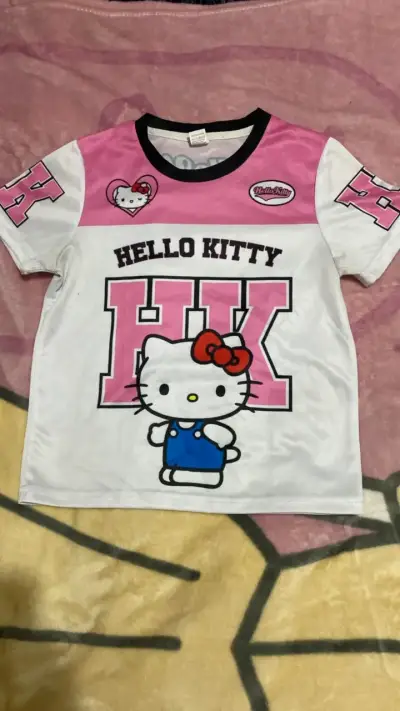 Polera Hello Kitty para niña en rosa y blanco - miniatura 1