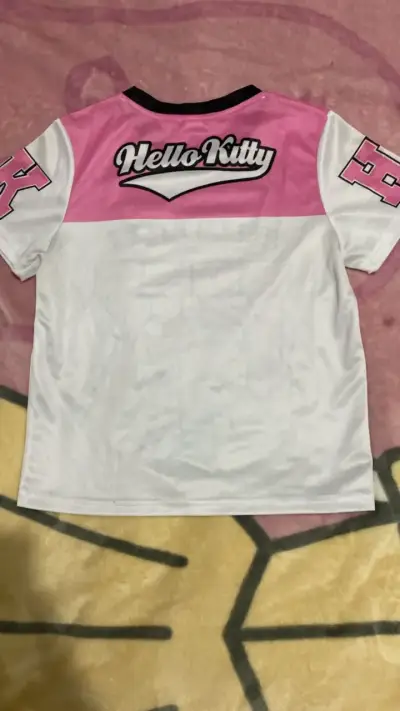 Polera Hello Kitty para niña en rosa y blanco - miniatura 2