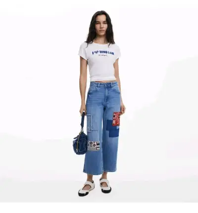 Jeans Desigual con parches decorativos - miniatura 1
