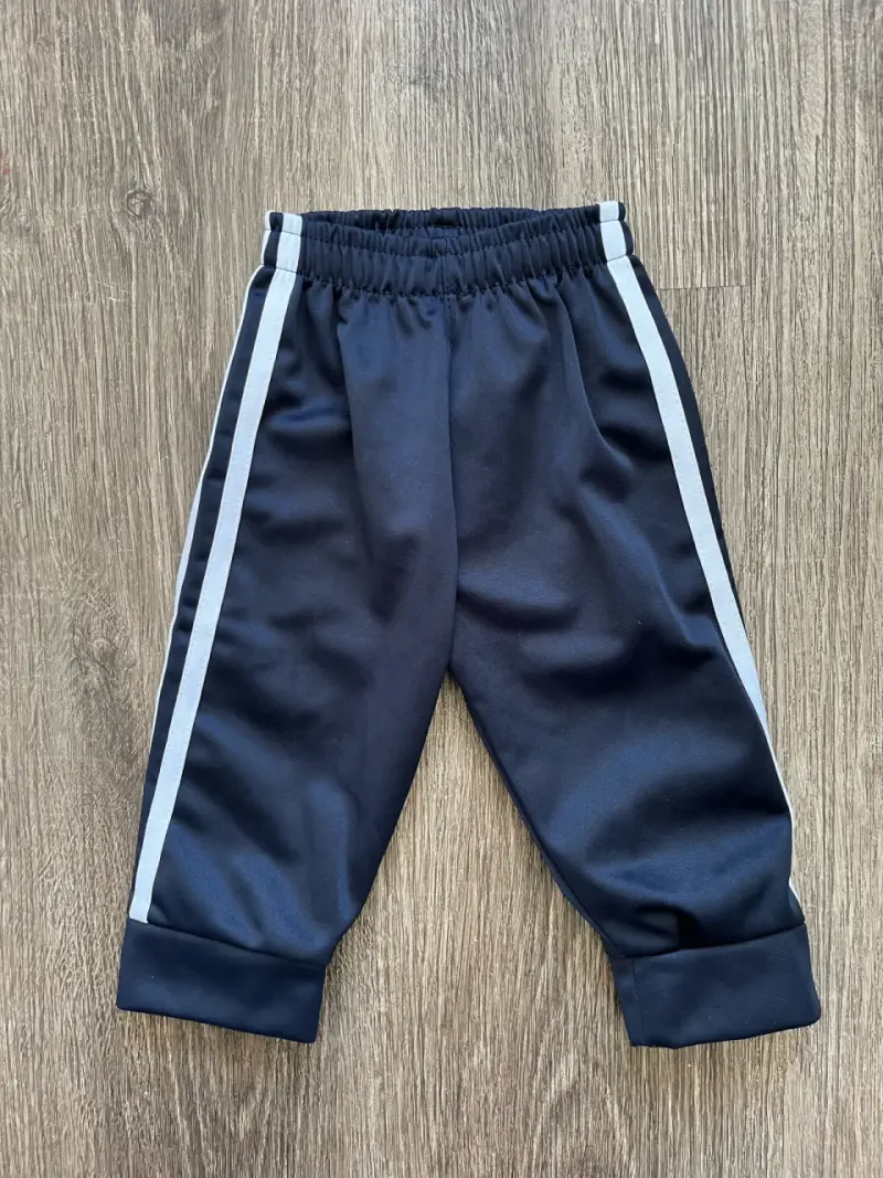 Pantalón buzo tipo Adidas