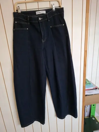 Pantalones anchos de mezclilla azul para mujer - miniatura 1