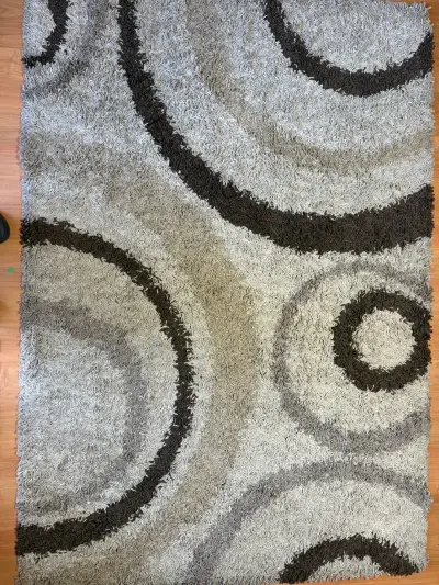 Alfombra moderna beige y marrón con diseño circular - miniatura 1