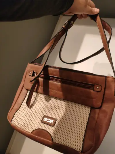 Cartera de cuero marrón con diseño tejido Secret - miniatura 1