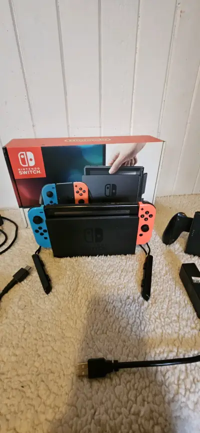 Consola Nintendo Switch neon - miniatura 1