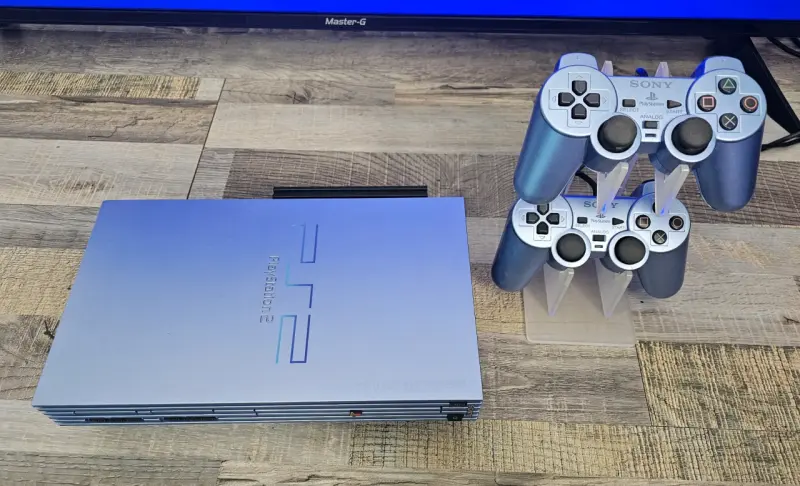 Consola Sony PlayStation 2 con dos controles - 4