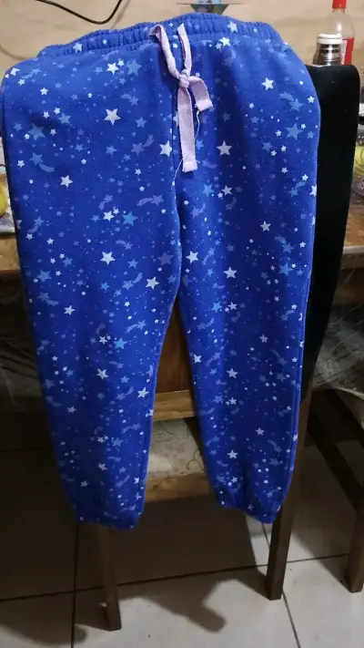 Pantalón de Buzo  azul con estrellas para niña - miniatura 1