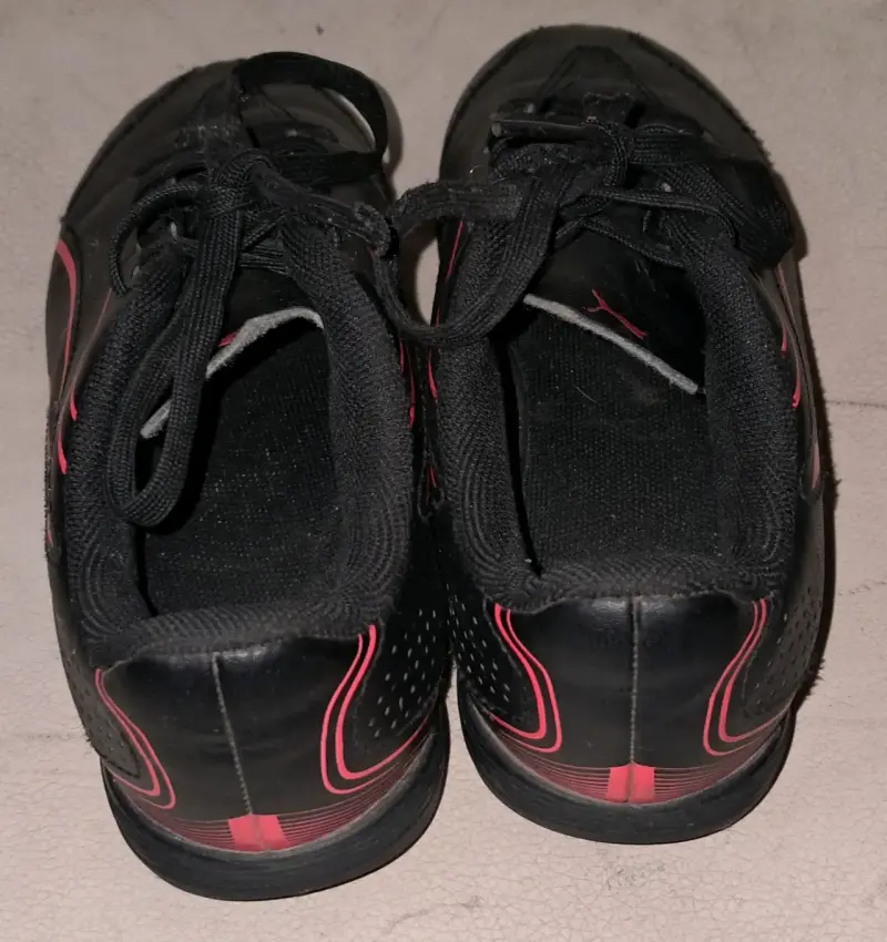 Zapatillas deportivas negras con detalles rojos Puma - 3