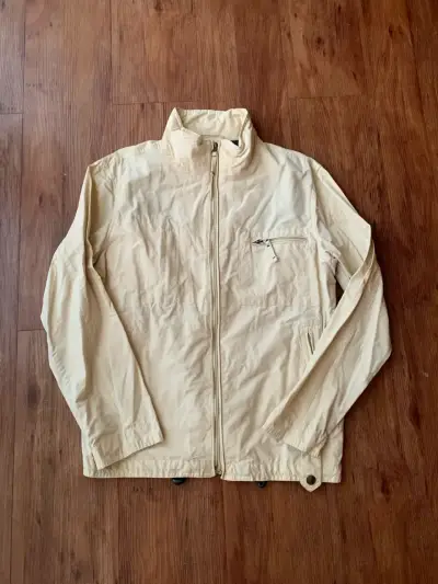 Chaqueta beige con cierre y bolsillos - miniatura 1