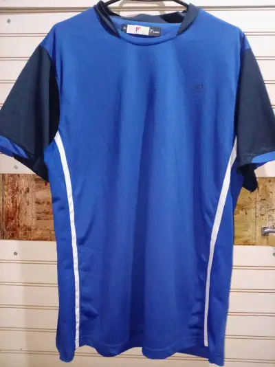 Polera deportiva azul y negra para hombre - miniatura 1