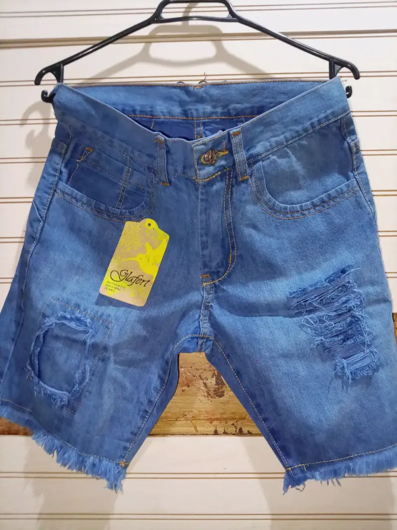 Shorts de mezclilla desgastados para hombre
