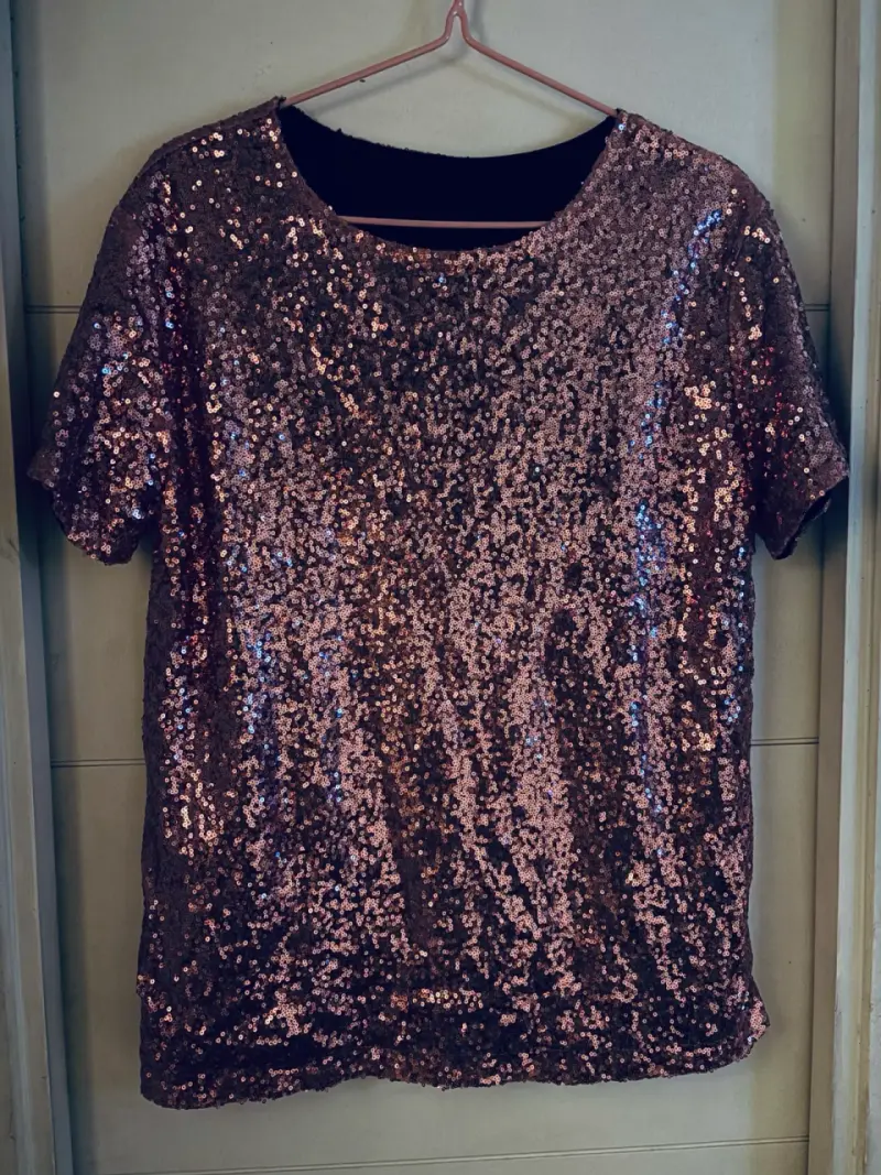 Polera de lentejuelas rosadas para fiesta