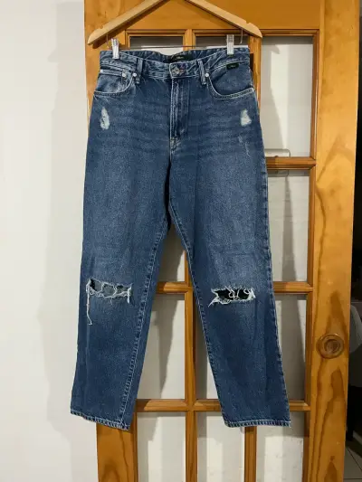 Jeans de mezclilla azul con roturas - miniatura 1
