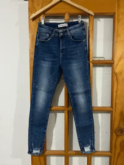 Jeans ajustados azul oscuro para mujer - miniatura 1