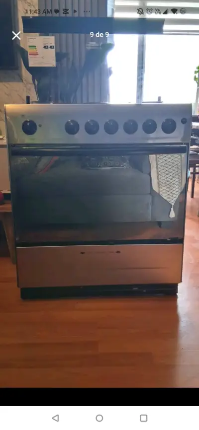 Cocina a gas de acero inoxidable con horno - miniatura 1