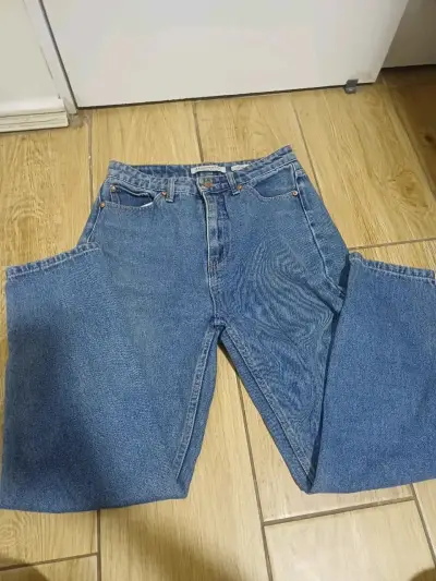 Jeans de mezclilla azul para mujer - miniatura 1