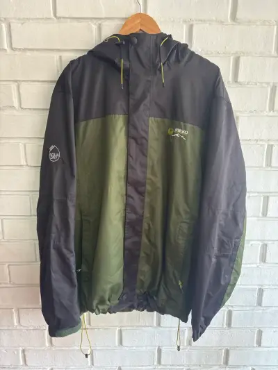 Chaqueta impermeable Nikko verde y negra - miniatura 1